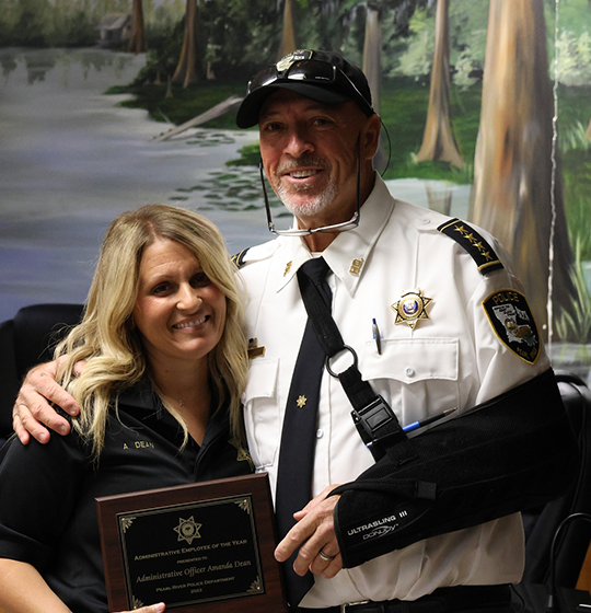 Administrative Officer Amanda Dean pictured with Chief Sessions