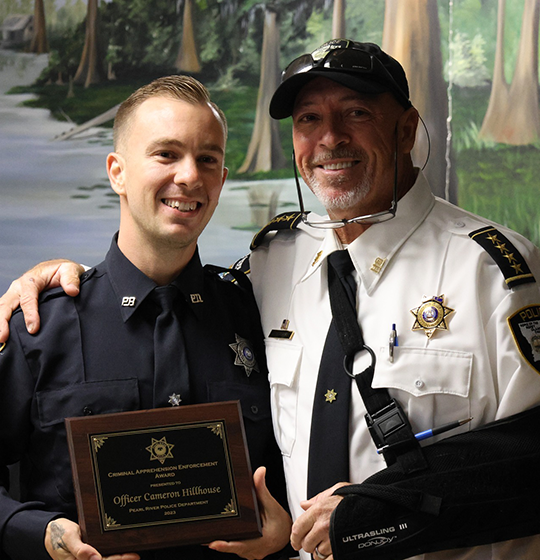 Officer Cameron Hillhouse pictured with Chief Sessions