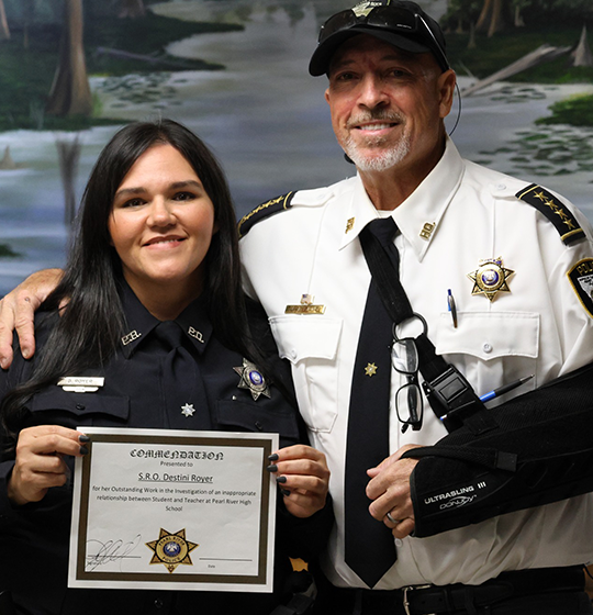 S.R.O. Destini Royer pictured with Chief Sessions